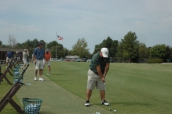 Loosening up at the Driving Range before tournament play
